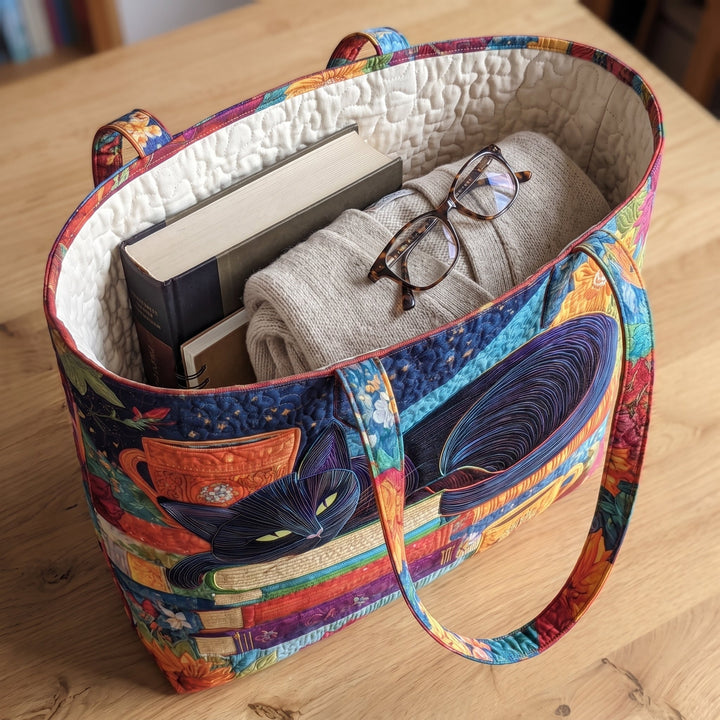 Artisan Bag - Black Cat with Books and Mugs — packed with a hardback book, a folded cardigan and reading glasses