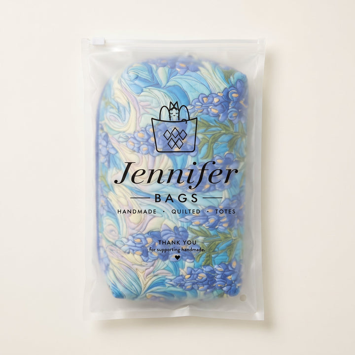 Floral Swirl Quilted Makeup Bag — packaged in its Jennifer Bags pouch