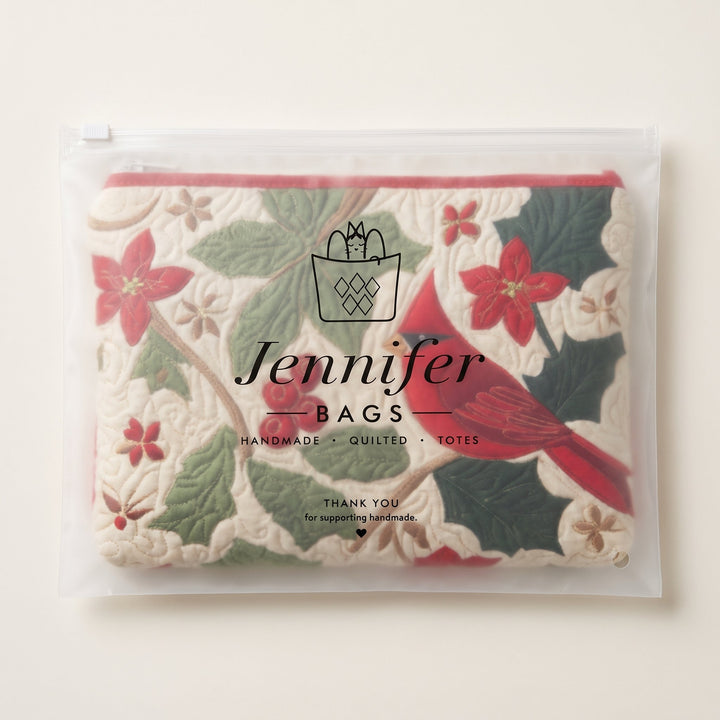 Holly Cardinal Quilted Makeup Bag — packaged in its Jennifer Bags pouch