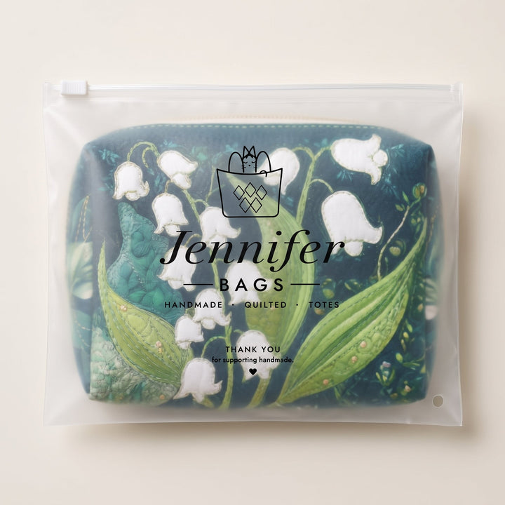 Lily Grace Quilted Makeup Bag — packaged in its Jennifer Bags pouch